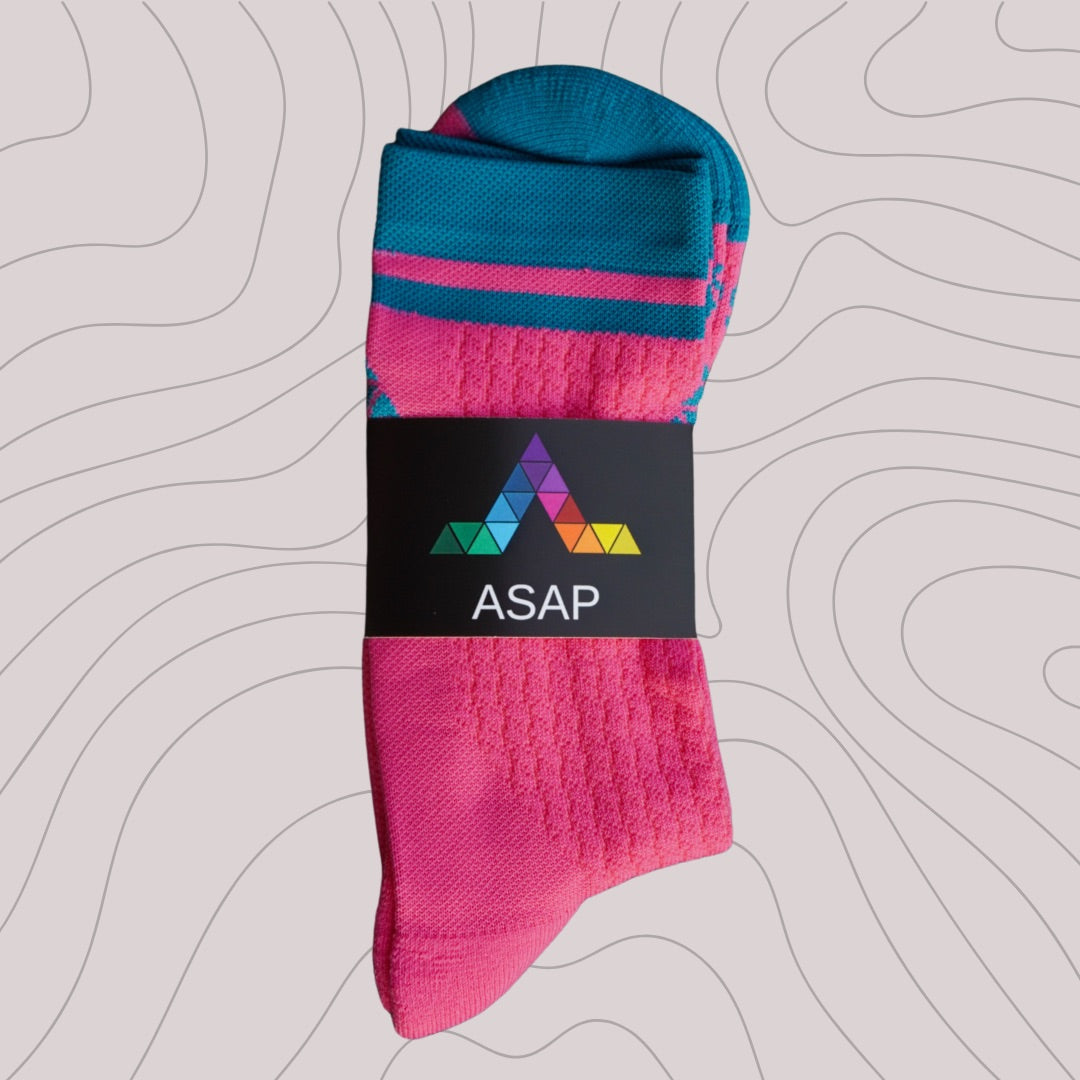 ASAP performance crew socks neatly packaged, showcasing the vibrant design through clear wrapping, perfect for gifting or retail display.