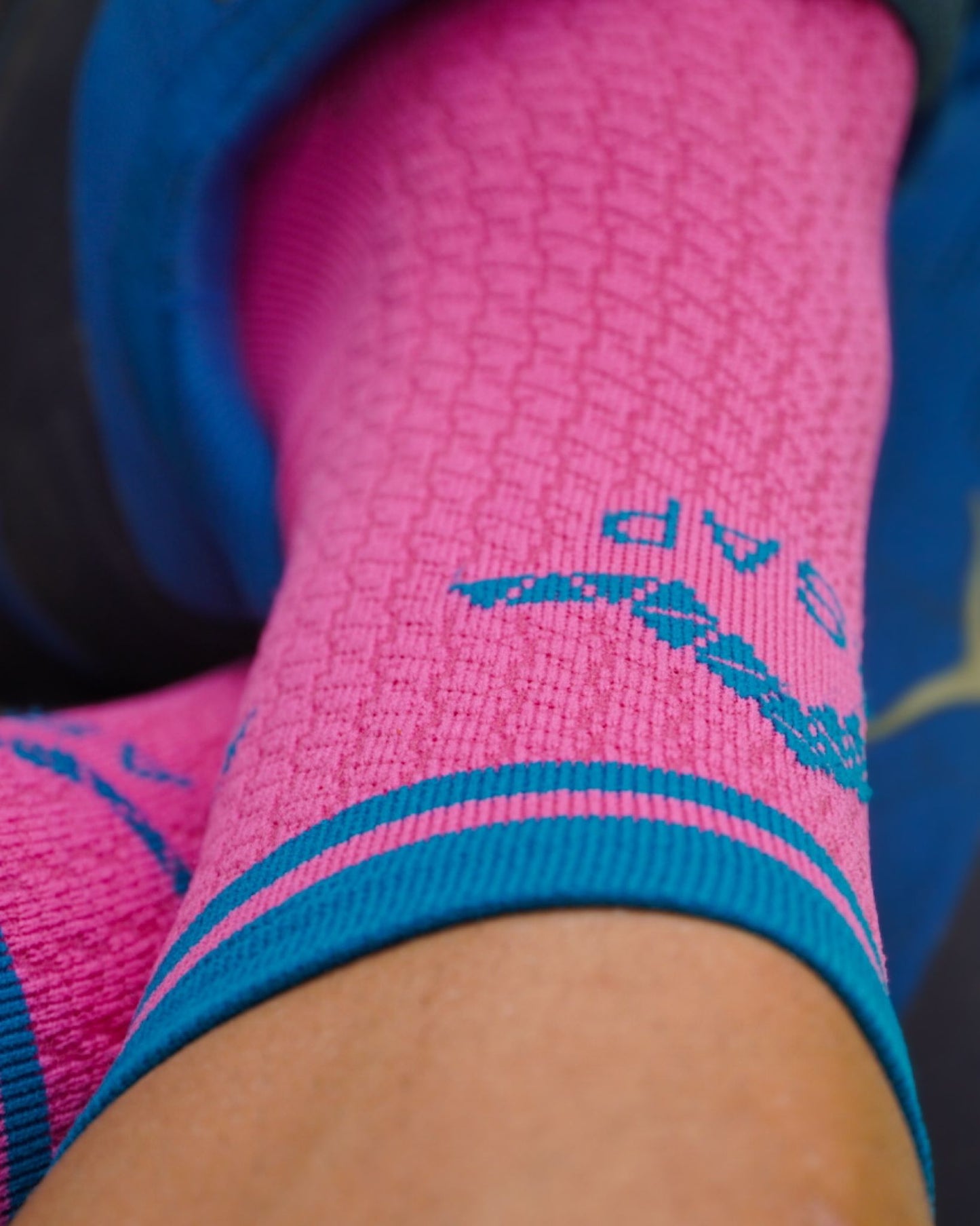 Portrait view of ASAP performance crew socks, featuring the bold design, 19 cm height, and breathable S-Mesh structure, ideal for active and stylish individuals.